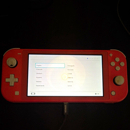 Nintendo switch lite coral - nintendo,